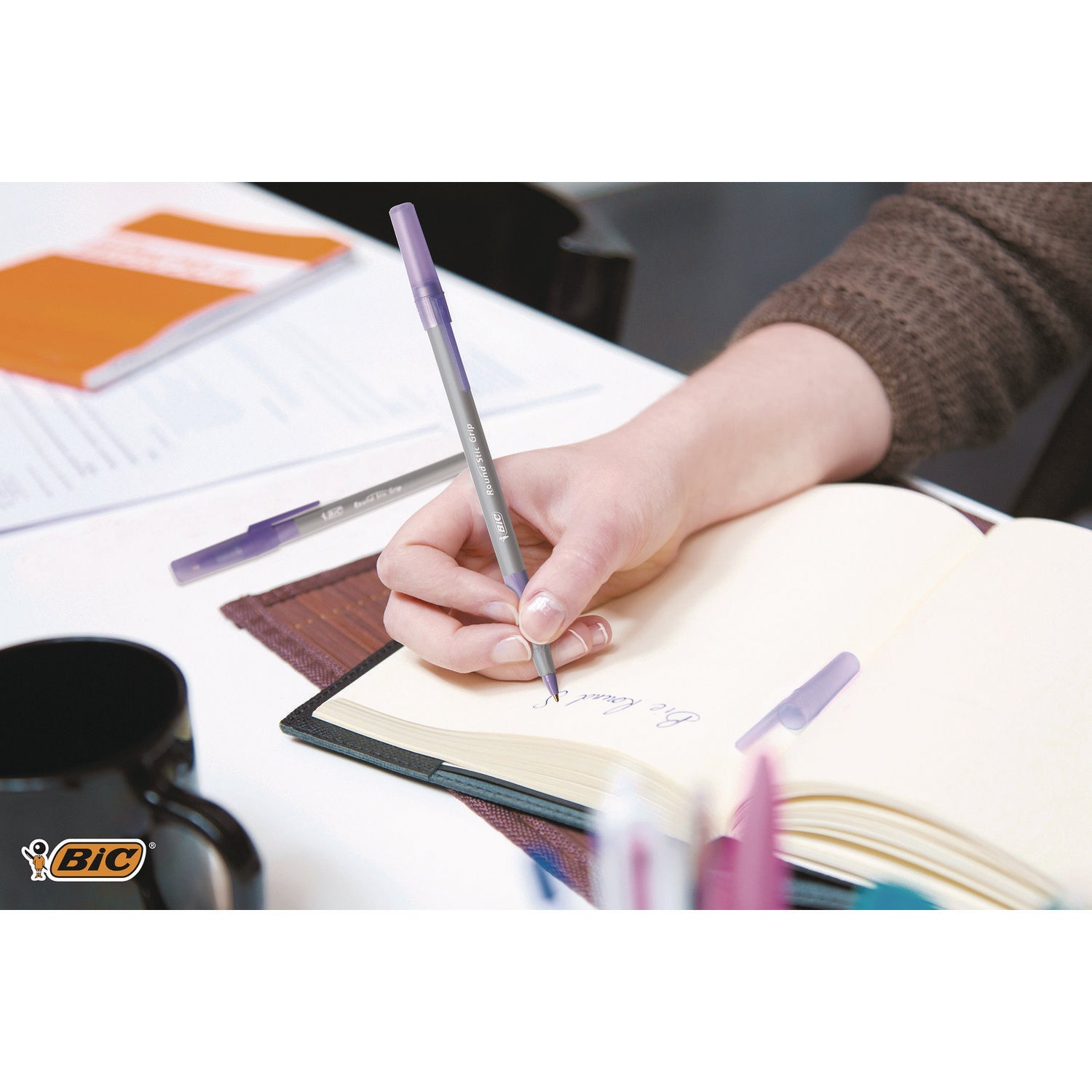 BIC® Round Stic Grip Xtra Comfort Ballpoint Pen, Easy-Glide System, Stick, Medium 1.2 mm, Purple Ink, Gray/Purple Barrel, Dozen