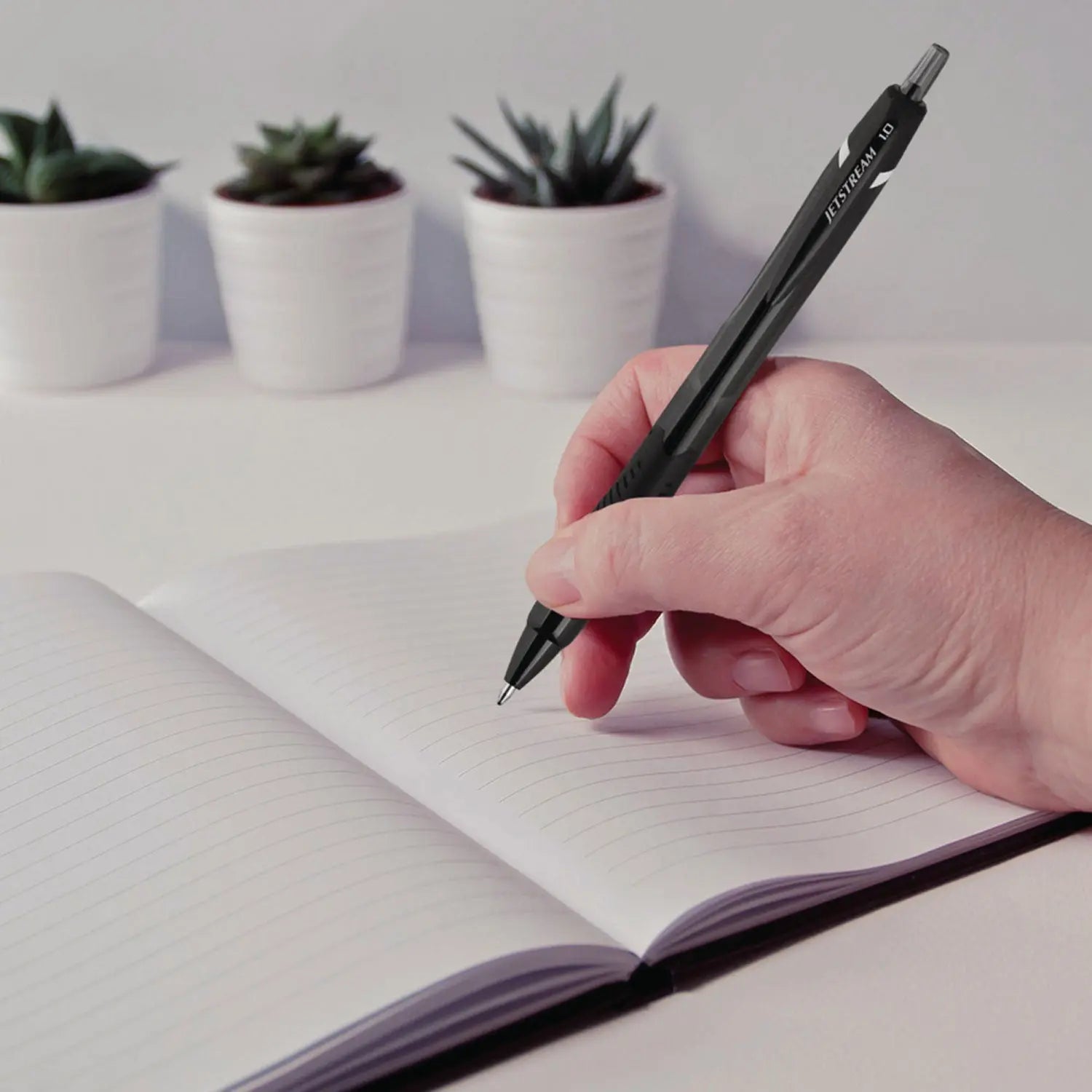 Jetstream Elements Hybrid Gel Pen, Retractable, Medium 1 mm, Black Ink, Black Barrel, Dozen uniball® Flipcost