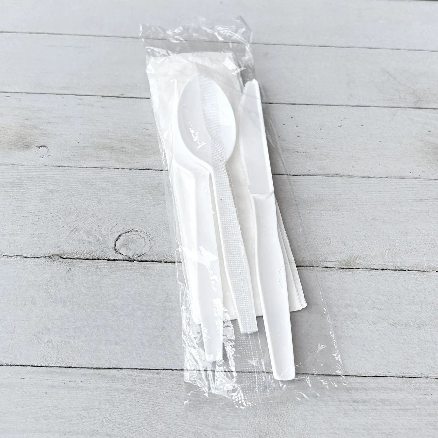 Four-Piece Cutlery Kit, Fork/Knife/Napkin/Teaspoon, Mediumweight, Polystyrene, White, 250/Carton Boardwalk® Flipcost